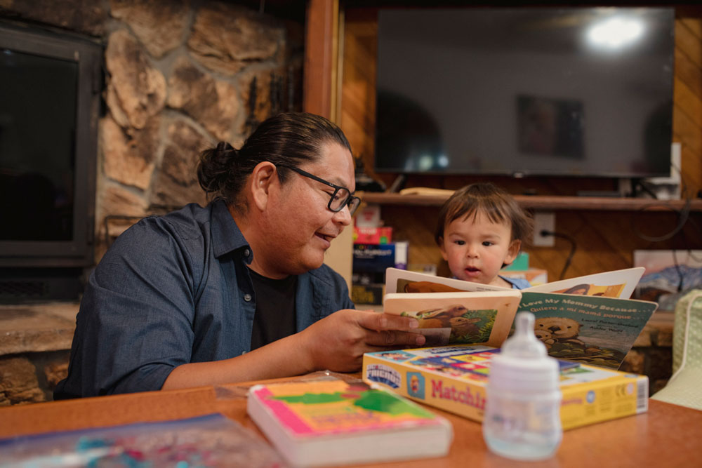 Byrickson reading with child.