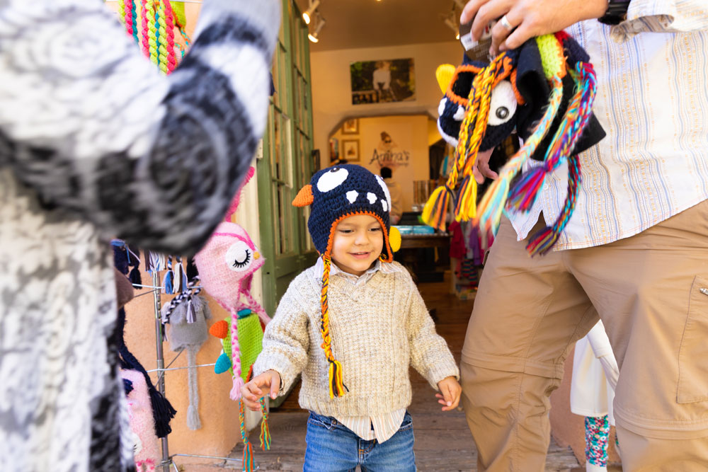 Taos kid walking from school with parents